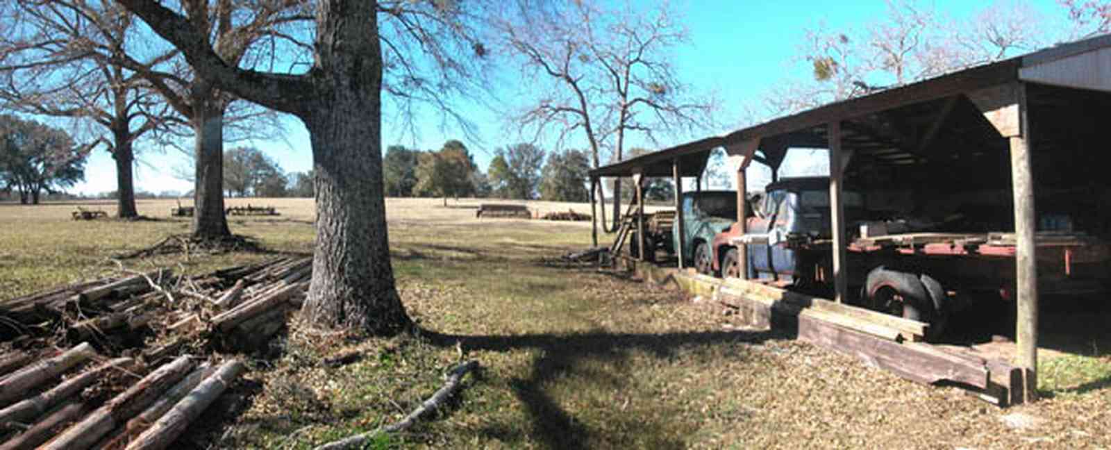 Allentown:-Mathews-Equipment-Barn_01.jpg:  pasture, farm, old trucks, fencing equipment, barn, fence posts