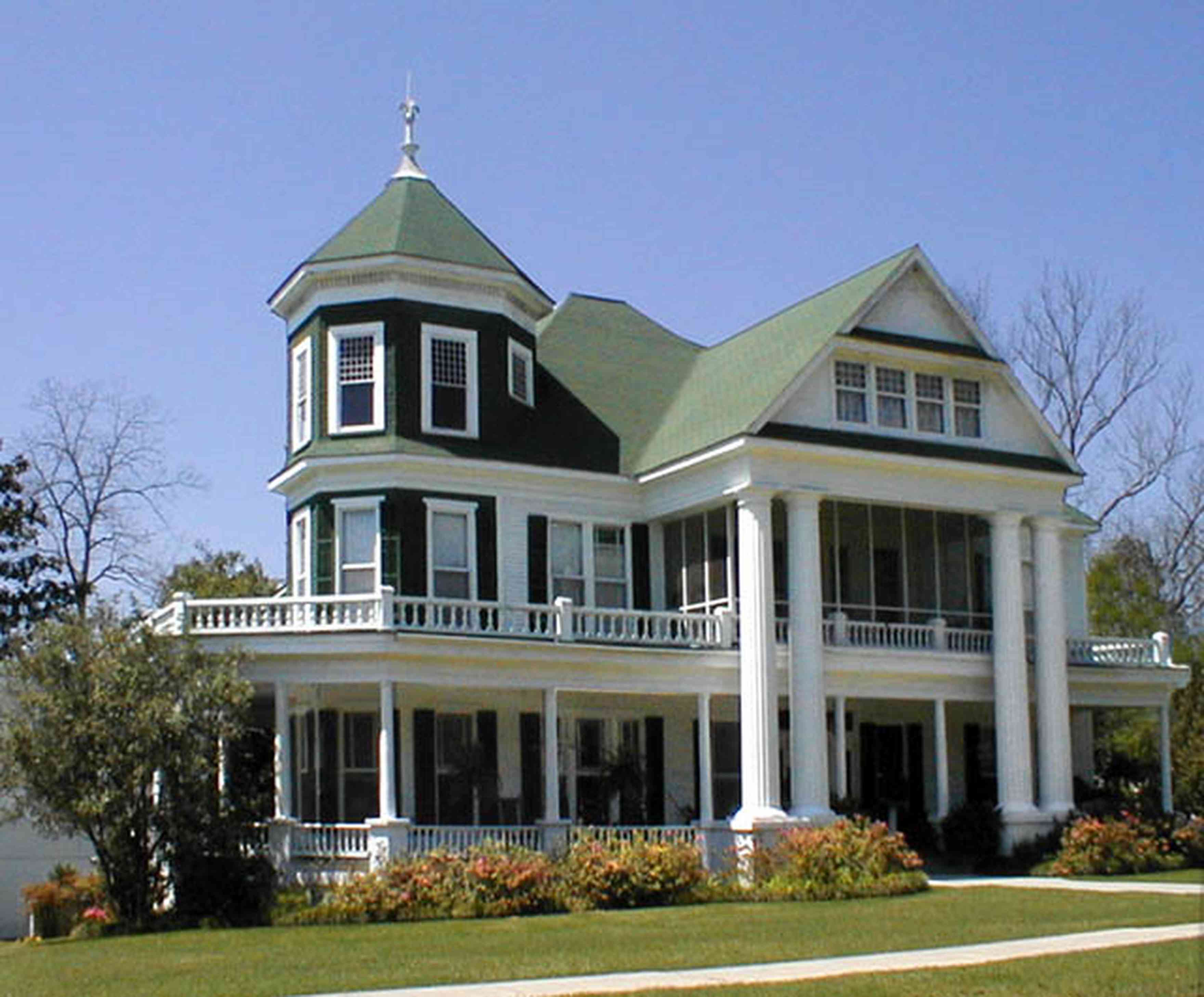 Brewton:-Belleville-Avenue_01.jpg:  victorian mansion, greek revivial architectural style, green roof, turret, 
