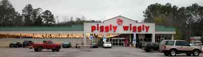 Century:-Piggly-Wiggly-Supermarket_02.jpg:  grocery store, green roof, parking lot