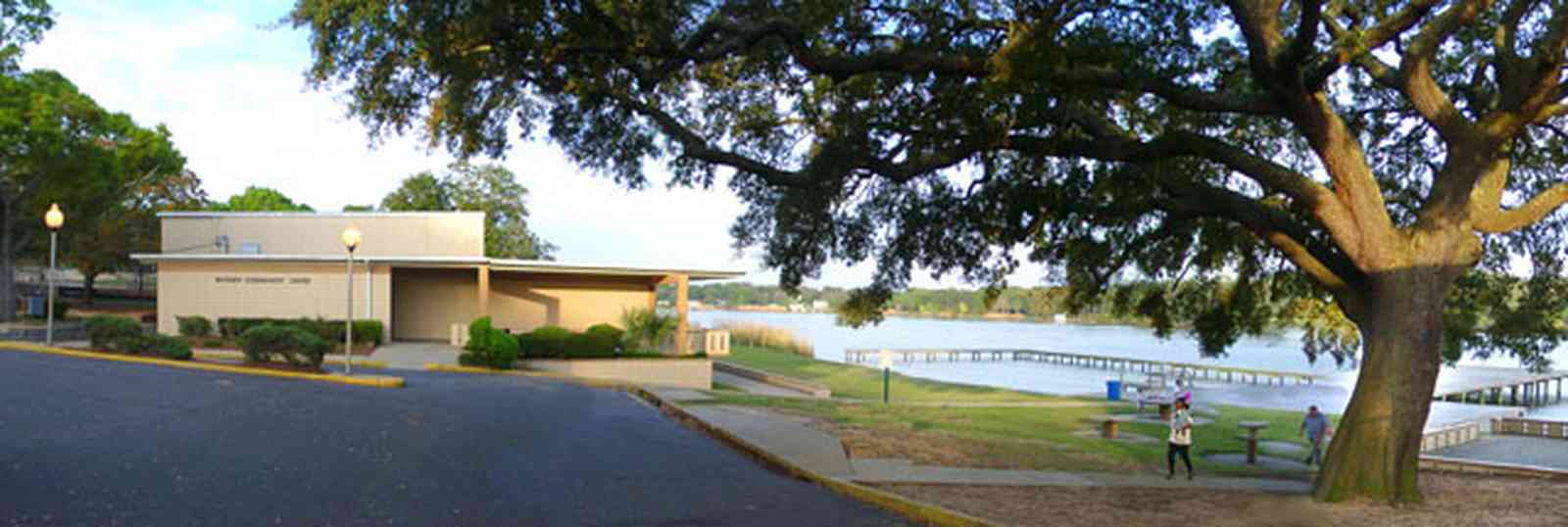 East-Hill:-Bayview-Park_02.jpg:  community center, oak tree, boardwalk, pier, dock, escambia county park, bayou texar, playground