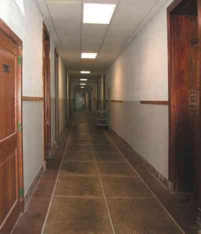 East-Hill:-Tower-East:-Old-Sacred-Heart-Hospital_38.jpg:  granite floor, hallway, gothic revival architecture, wooden doors