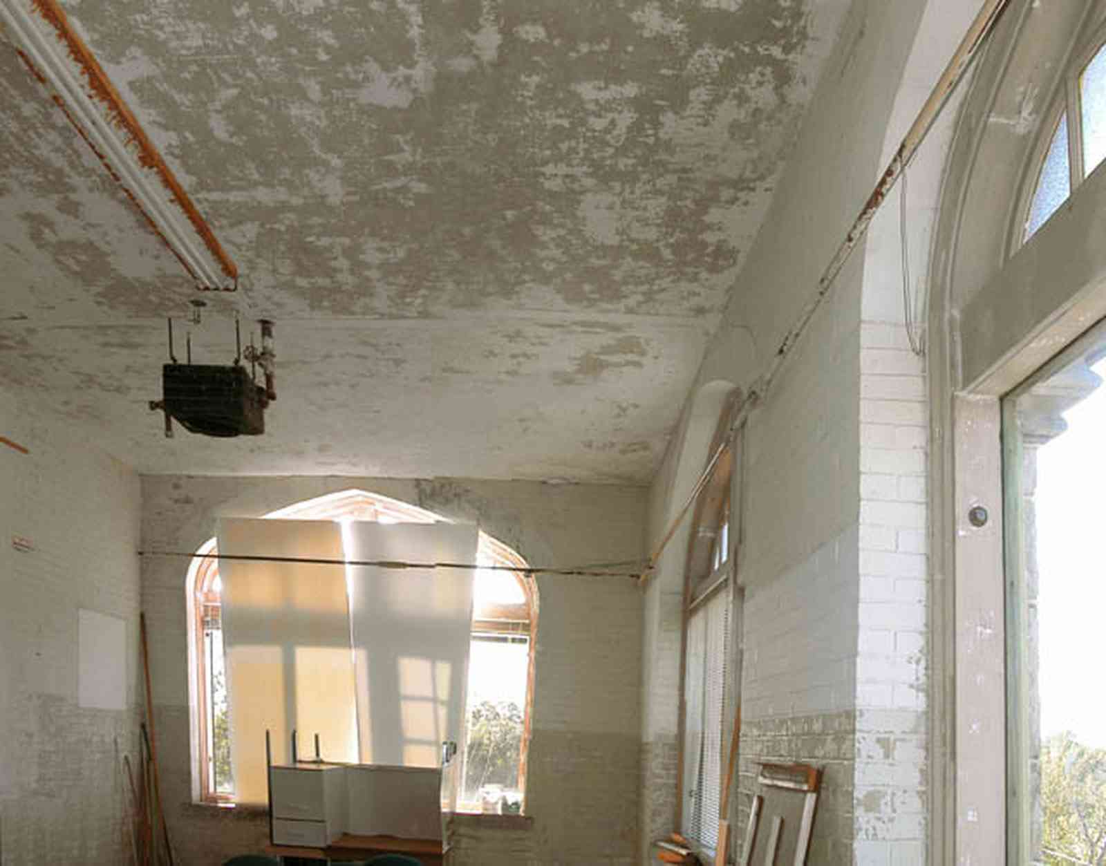 East-Hill:-Tower-East:-Old-Sacred-Heart-Hospital_45b.jpg:  gothic revival architecture, plaster walls, upstairs windows