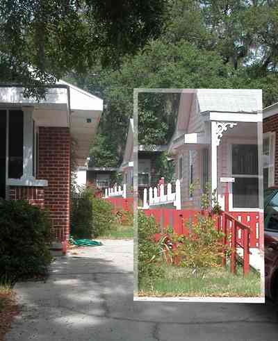 East-Pensacola-Heights:-118-Bayou-Blvd_02.jpg:  craftsman cottage, spanish moss, bayou texar, oak tree, red brick house
