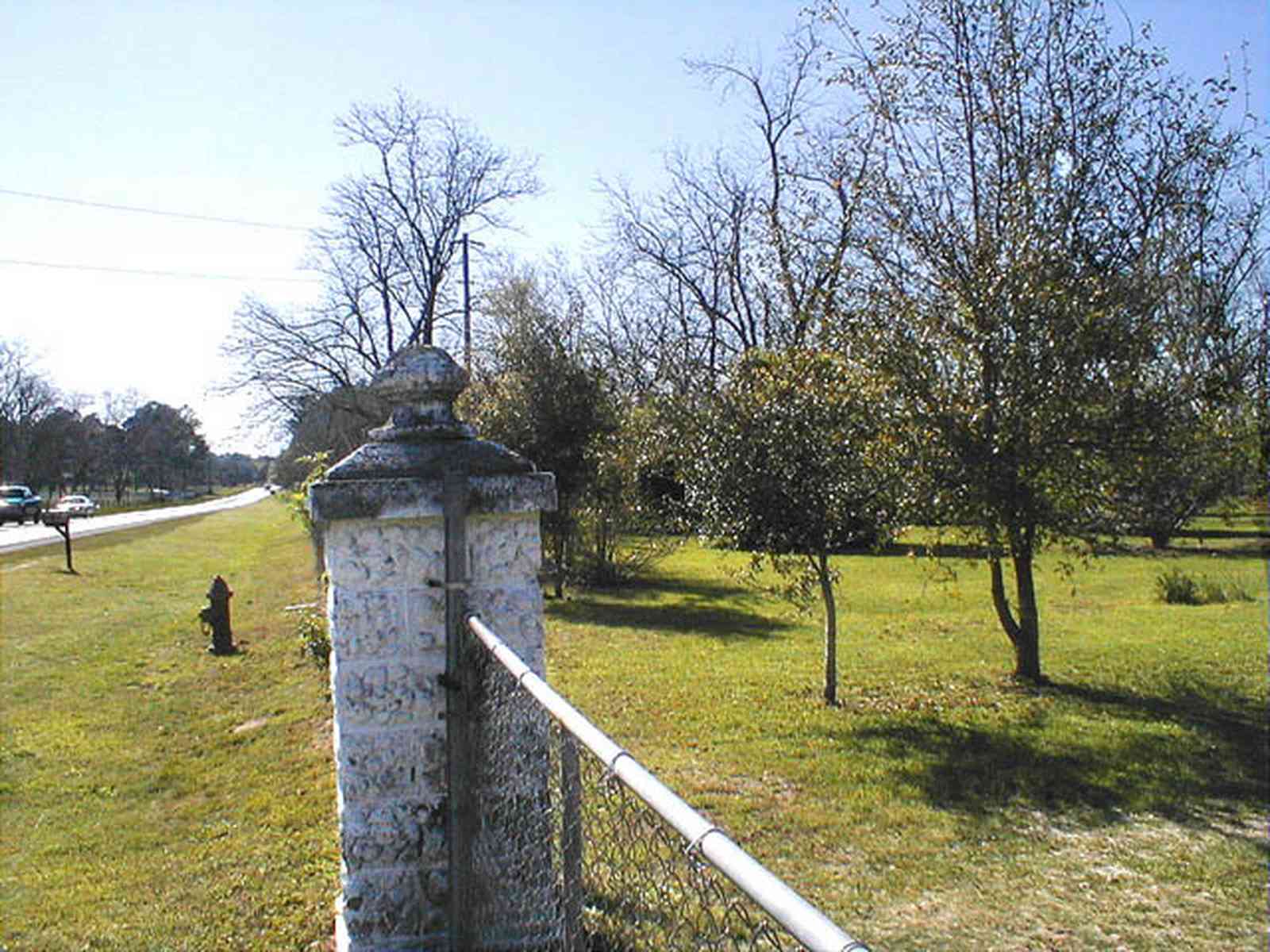 Elberta:-Farm_00.jpg:  pecan orchard, gate, fence, pillars, alabama, highway 98