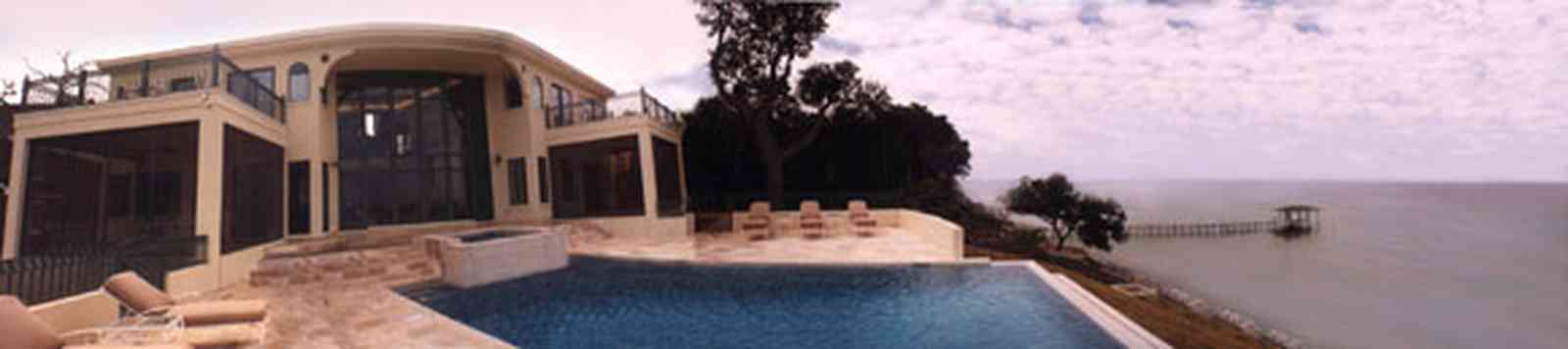 Gulf-Breeze:-Couch-Dreams_pool.jpg:  turret, dormer windows, pyramidal roofgulf coast, gulf of mexico, swimming pool, northern facade, swimming pool, marble decking