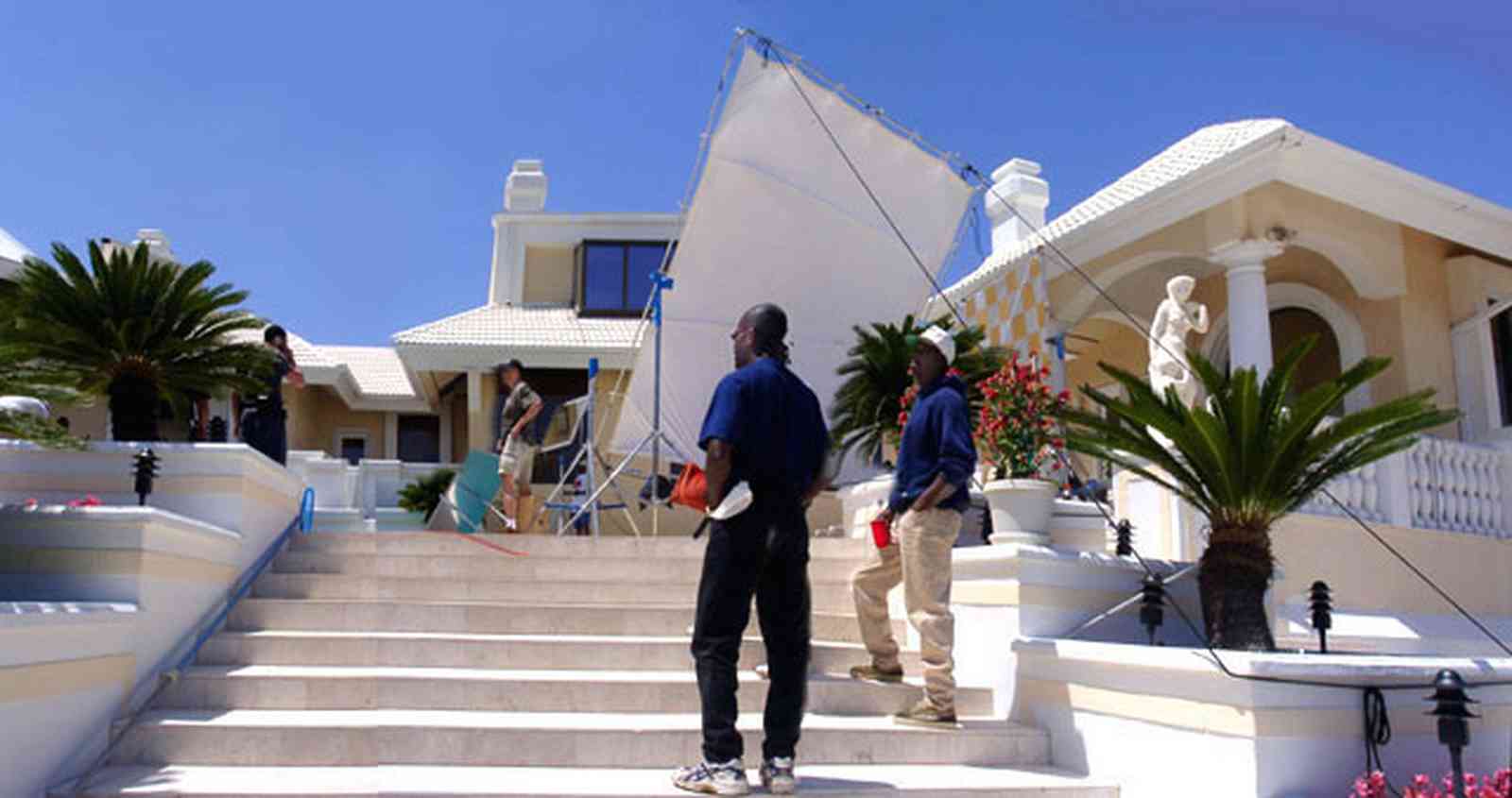 Gulf-Breeze:-Levin-House_14.jpg:  marble steps, roy jones, grecian statuary, palm tree