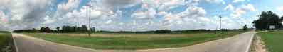 Hollandtown:-Holland-Farm:-North-Field_05.jpg:  farmland, farm, country road, two-lane road, tilled field, farmer, crop