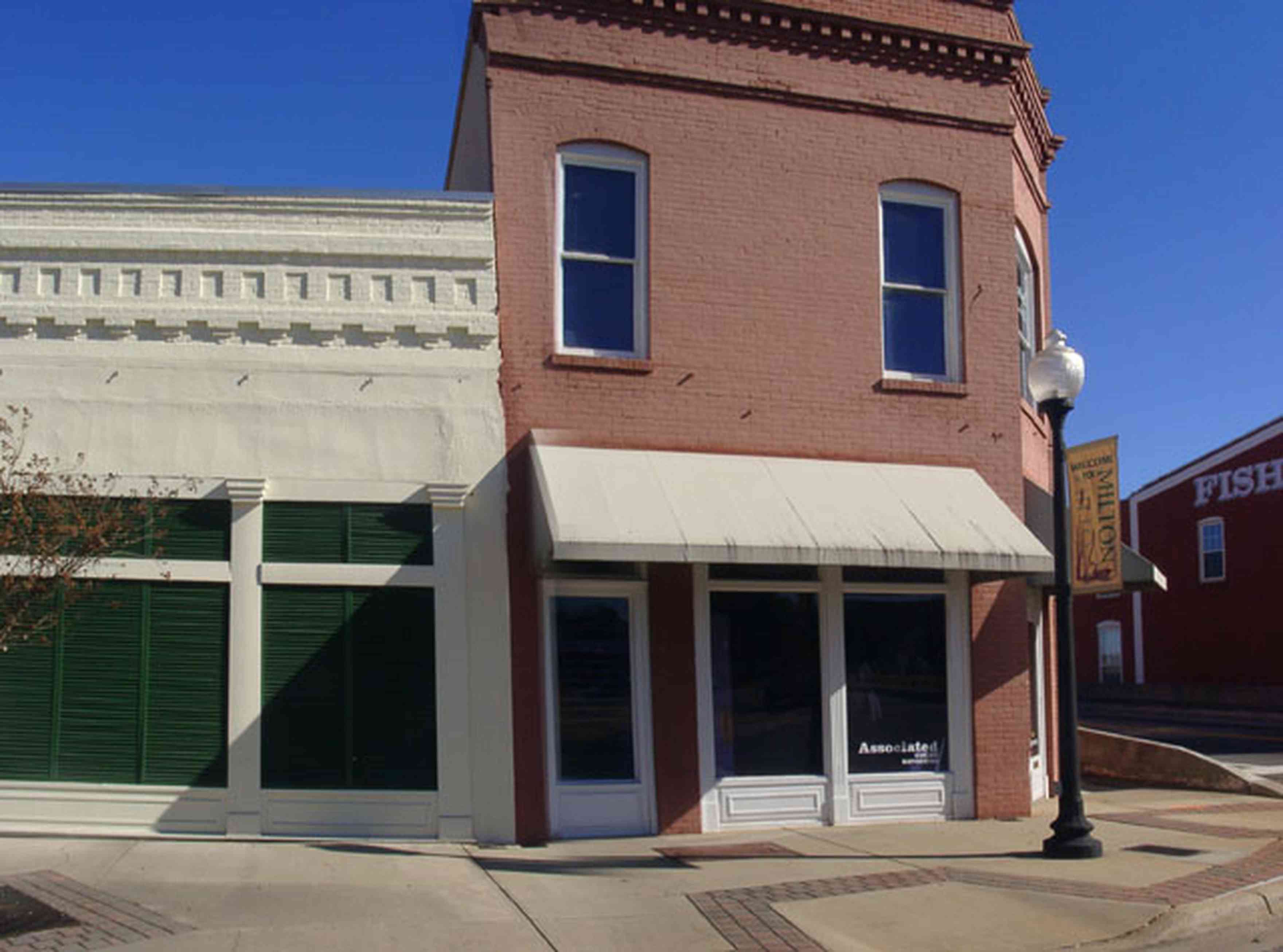 Milton:-128-Willing-Street_01.jpg:  store-front, awning, downtown milton, mill town, office building, , Town