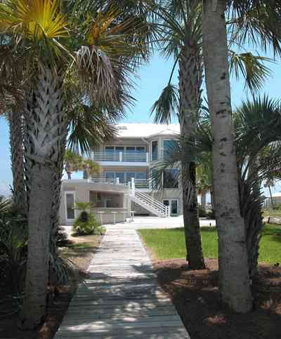 Navarre:-7332-Grand-Navarre-Blvd_05.jpg:  palm trees, cabana bar, beach house, dock, deck