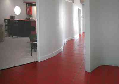 Navarre:-7332-Grand-Navarre-Blvd_25.jpg:  red tile floor, bar, den, art deco decor, art deco house, beach house
