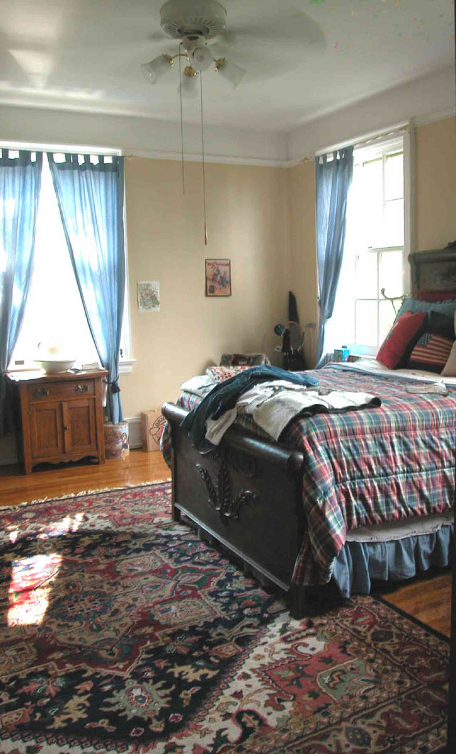 North-Hill:-105-West-Gonzales-Street_64.jpg:  oriental rug, sleigh bed, drapes, antique furniture, quilt, hardwood floor