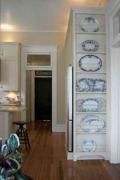 North-Hill:-116-DeSoto-St_02i.jpg:  blue willow china, dish display, heartpine floors, kitchen, door transom
