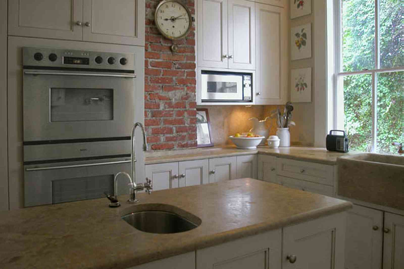 North-Hill:-116-DeSoto-St_02j.jpg:  kitchen, brick wall, stainless steel oven, kitchen sink