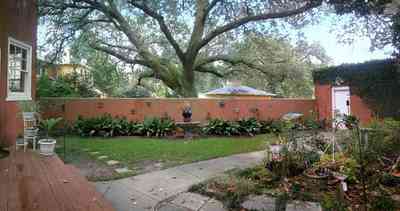 North-Hill:-123-West-Lloyd-Street_29.jpg:  backyard, garden, garage, garden house, sidewalk, stucco walls, oak trees