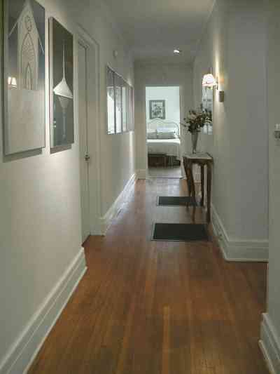 North-Hill:-123-West-Lloyd-Street_33.jpg:  hall, bedroom, heart pine flooring