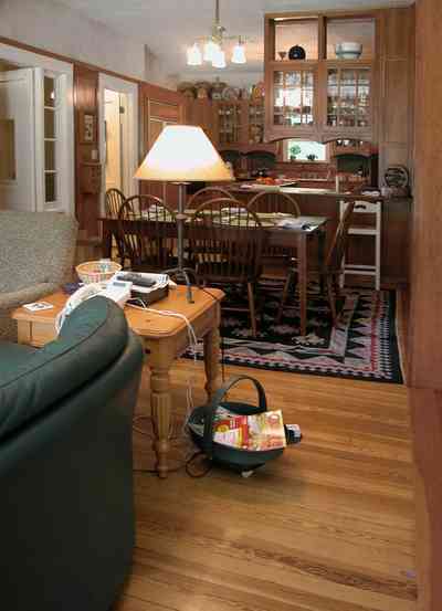 North-Hill:-284-West-Gonzales-Street_22.jpg:  kitchen, dining room, oriental rug, leather sofa, china cabinet, craftsman cottage