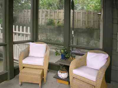 North-Hill:-284-West-Gonzales-Street_29.jpg:  wicker chairs, picket fence, screened porch, garage apartment, craftsman cottage