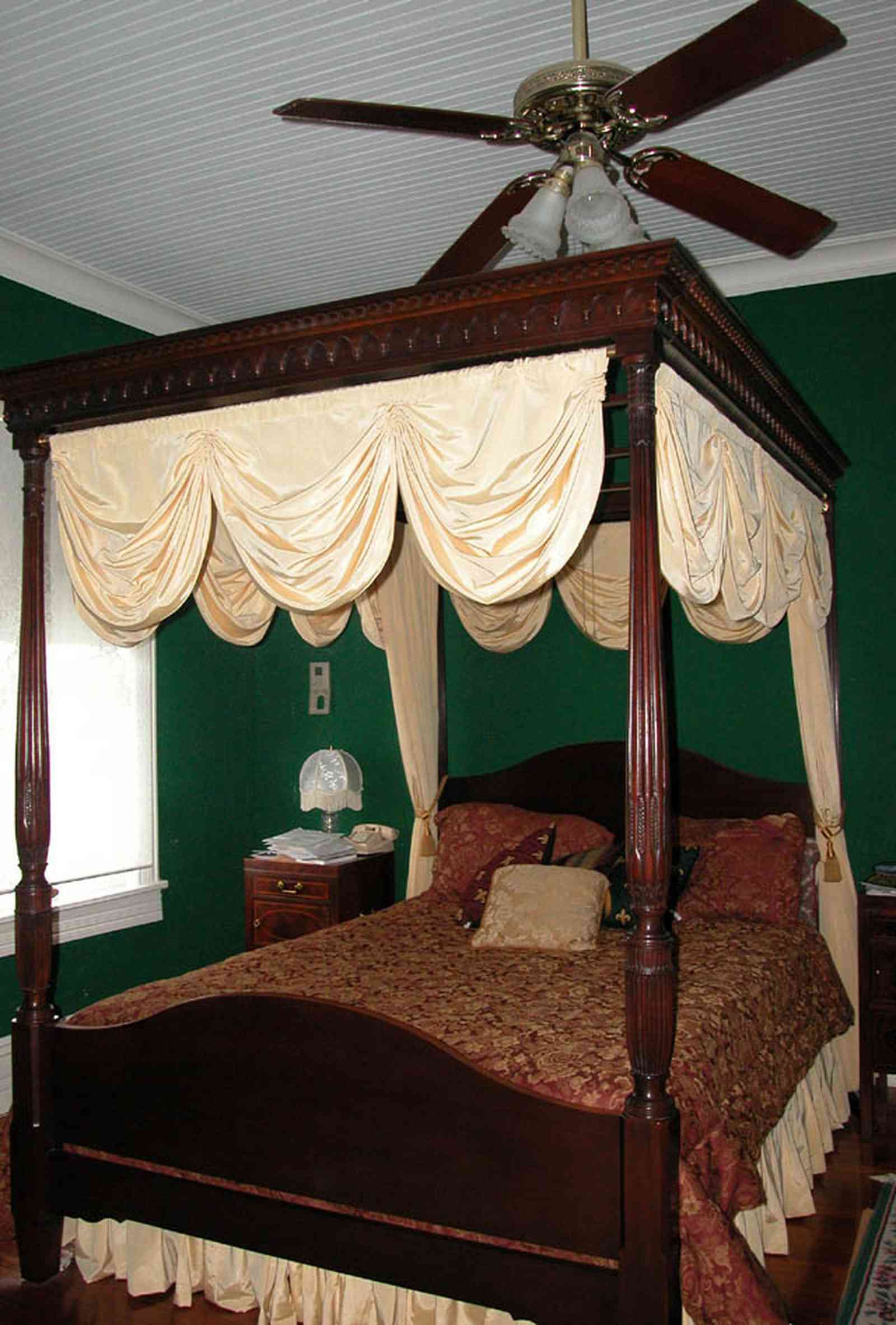 North-Hill:-52-West-Gonzalez-Street_19.jpg:  canopy bed, damask bedspread, four-poster bed, swag curtain, ceiling fan