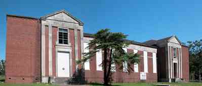 North-Hill:-Blount-School_03.jpg:  oak tree, brick building, school, high school, pediment, renaissance revival, columns, doric columns, steps