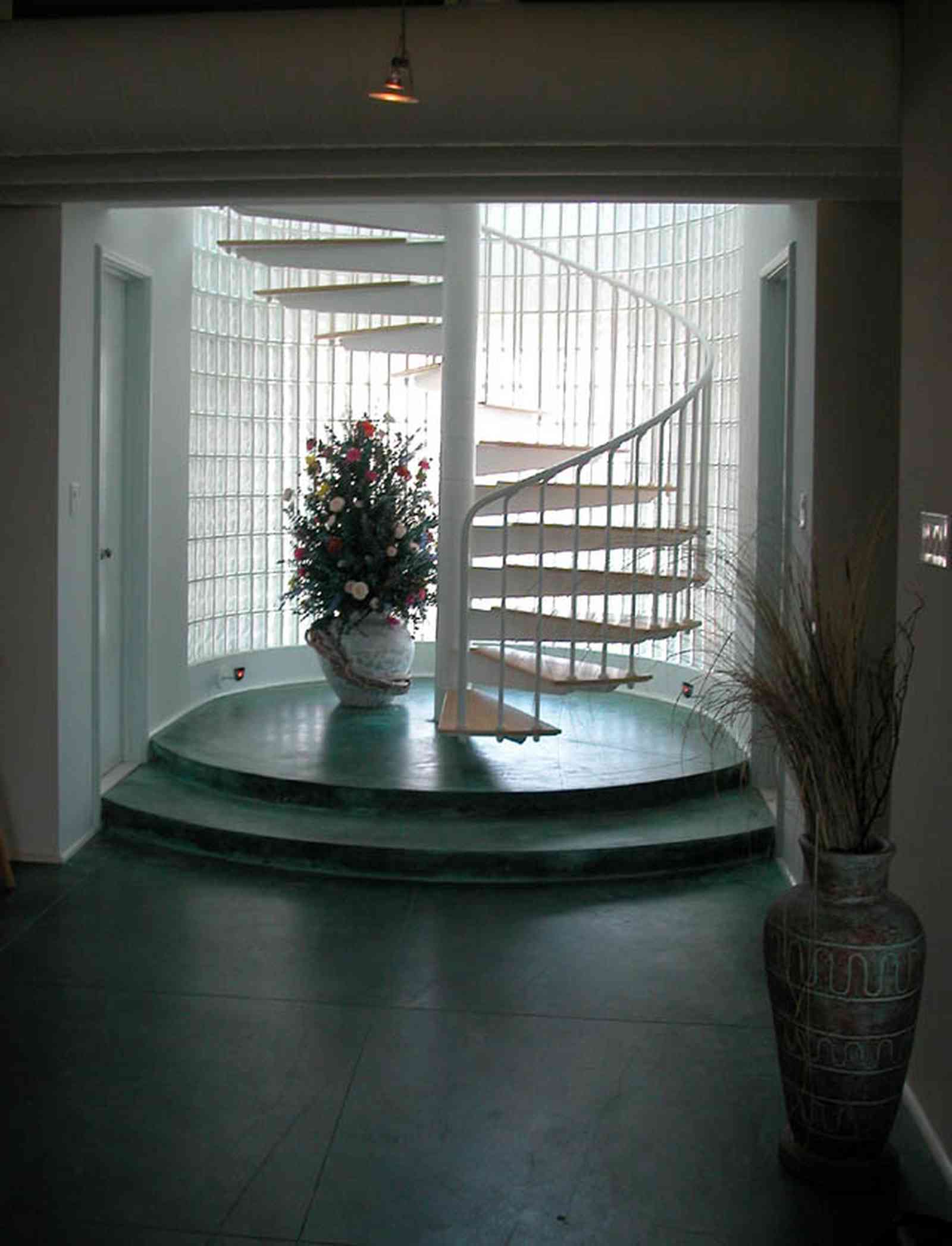 Pensacola-Beach:-Ariola-Drive-Art-Deco-House_20.jpg:  sand, crystal sand, white sand, sugar sand, sea oats, bauhaus architectural style, palm trees, dune restoration, stairs, glass railing, wooden deck, front door, staircase, glass blocks,  beachfront property
