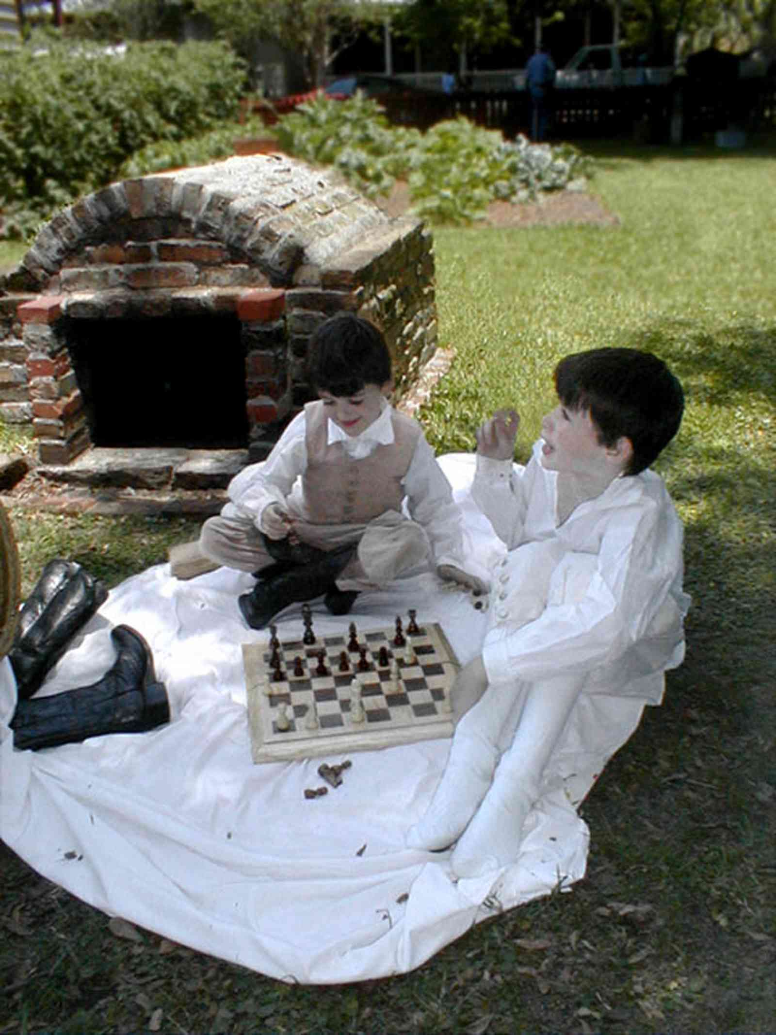 Pensacola:-Historic-Pensacola-Village:-LaValle-House_2b.jpg:  historic village, reenactors, kitchen garden, brick oven, chess game, children
