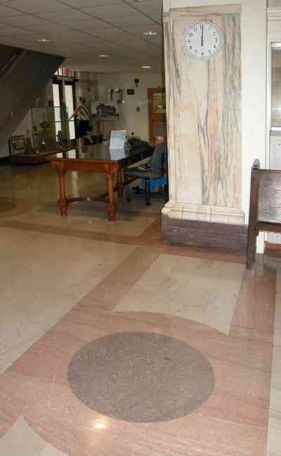 Pensacola:-Palafox-Historic-District:-Escambia-County-Courthouse_05.jpg:  marble floor, marble walls, oak table, foyer, entrance, courthouse, public building