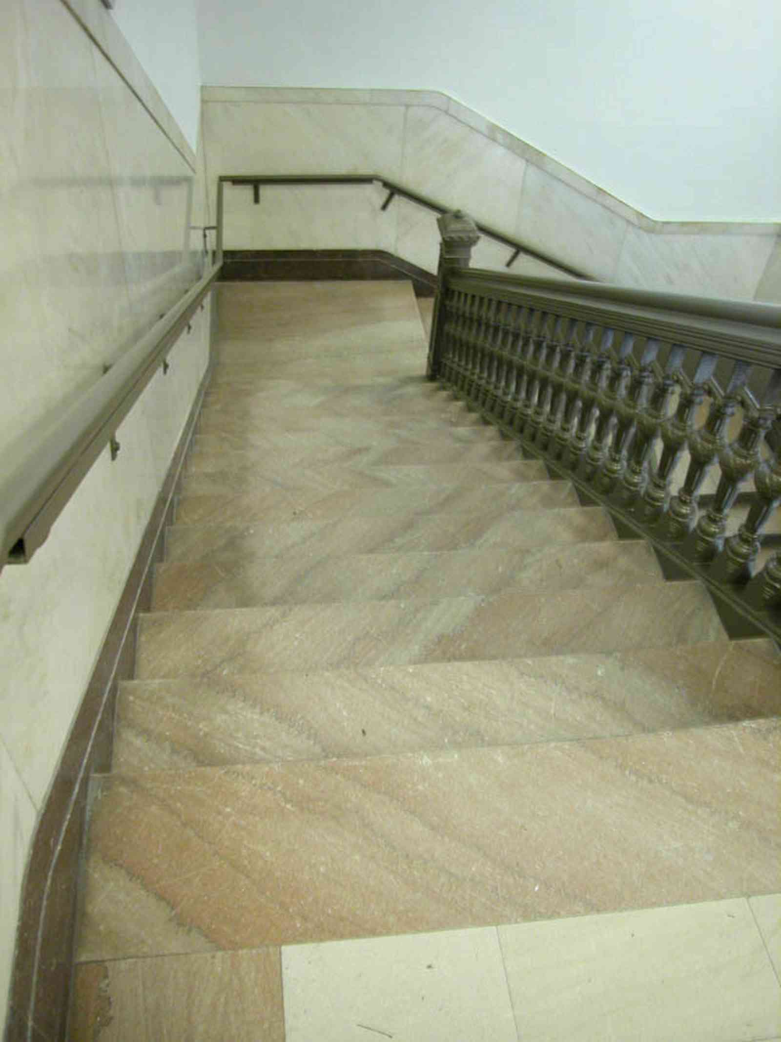 Pensacola:-Palafox-Historic-District:-Escambia-County-Courthouse_09a.jpg:  marble floor, marble walls, oak table, foyer, entrance, courthouse, marble staircase, iron railings, public building