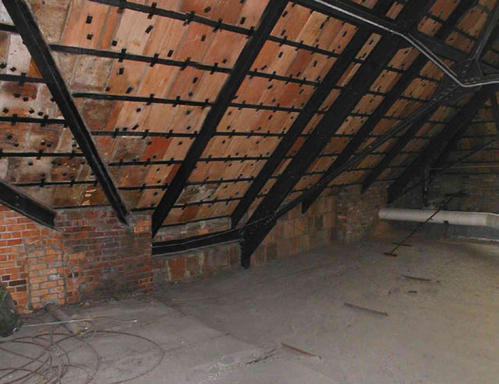 Pensacola:-Palafox-Historic-District:-Escambia-County-Courthouse_10.jpg:  attic, roof tiles, metal spring tension braces, brick walls