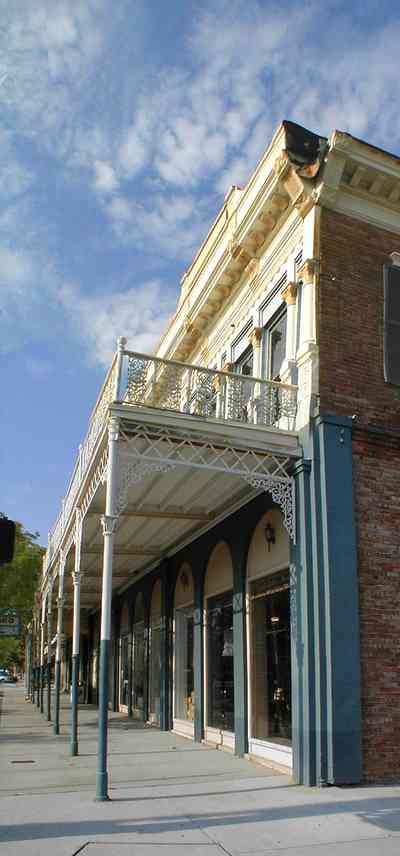 Pensacola:-Palafox-Historic-District:-Penko-Restaurant-Supply_02.jpg:  historic district, restaurant supply, victorian building, metal work, wrought iron, balcony