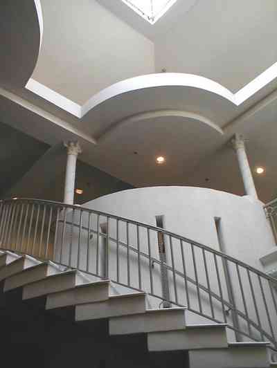 Pensacola:-Palafox-Historic-District:-Saenger-Theatre_04.jpg:  movie theatre, lobby, curving staircase, sky light
