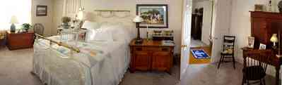 Pensacola:-Seville-Historic-District:-227-East-Intendencia-Street_17.jpg:  folk victorian house, bedroom, brass bed