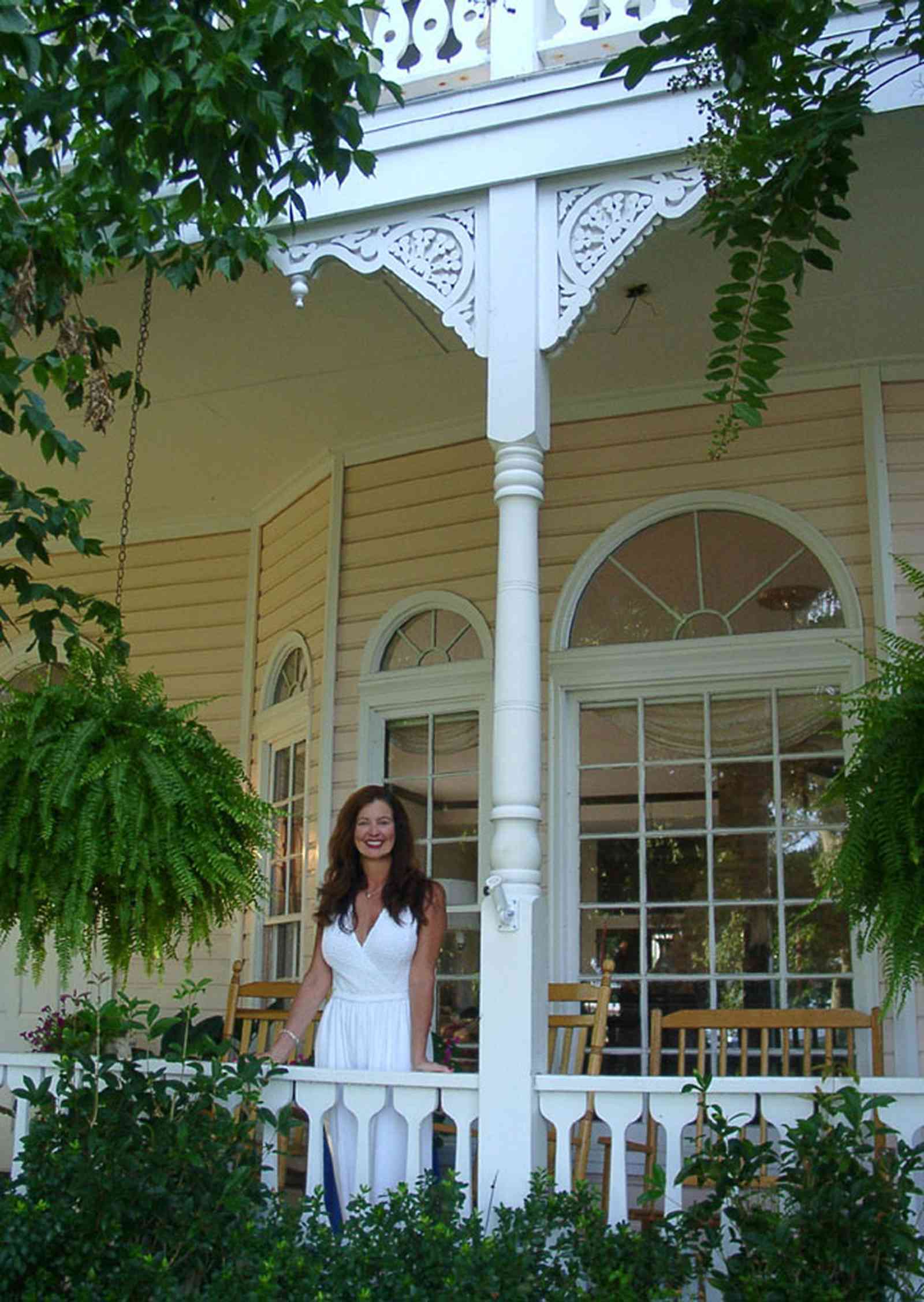 Pensacola:-Seville-Historic-District:-BW-Properties_01.jpg:  victorian front porch, bannister, folk victorian, gingerbread trim