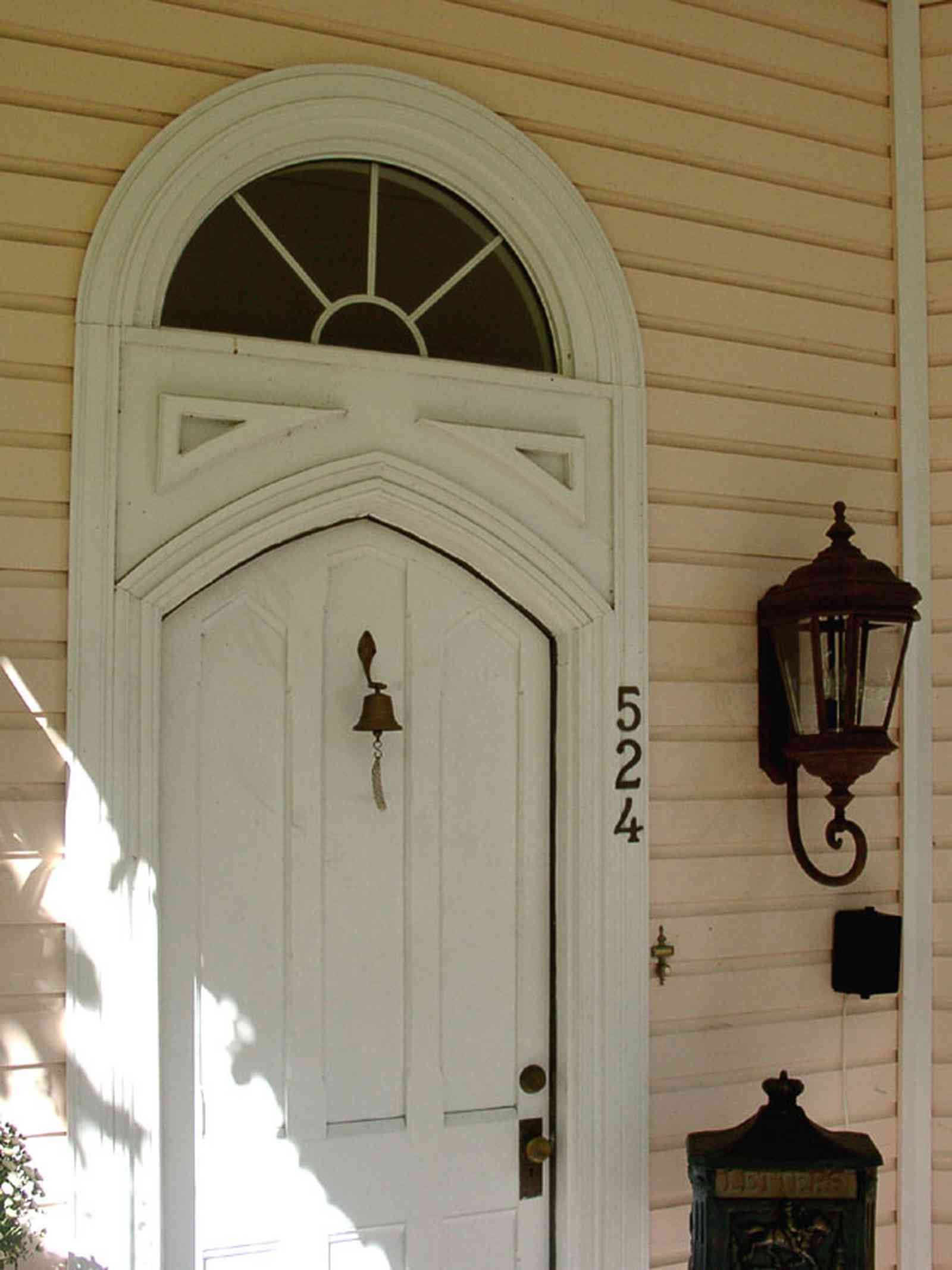Pensacola:-Seville-Historic-District:-BW-Properties_10.jpg:  door, lantern, mail box, transom, german church door, door bell