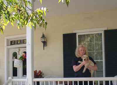 Pensacola:-Seville-Historic-District:-Chloe-And-Sophies-Attic_07.jpg:  victorian cottage, puppy, porch, antique shop, 