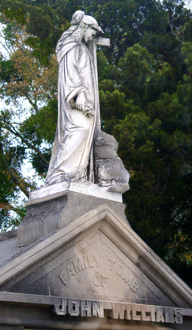 cemetery crypt marble raised statue tomb