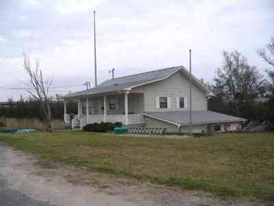 Pensacola:-Swamp-House_13.jpg:  road, house, swamp, bleak, 