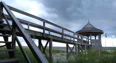 Perdido-Key:-Gothic-House_07.jpg:  gazebo, beach, dune, sand, sea oats, steps, deck, pier, gulf of mexico, cumulus cloud, storm, beach