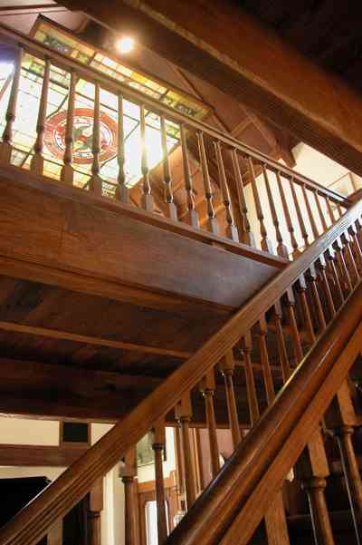 Perdido-Key:-Gothic-House_08r.jpg:  staircase, heartpine lumber, skylight, stained glass window