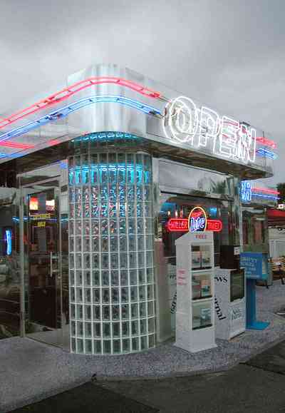 Pine-Forest:-50s-Diner_03.jpg:  neon sign, 1950 style, glass blocks, newspaper stand, stainless steel, park bench, hamburgers, green fried tomatoes