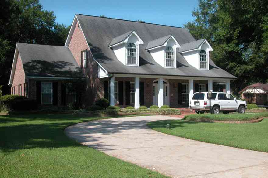 Scenic-Highway:-4491-Canopy-Road_03.jpg:  colonial architectural style, oak tree, subdivision, dormer window, circular driveway