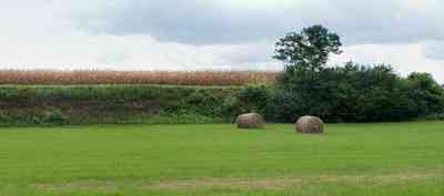 Walnut-Hill:-Kansas-Road:-Dairy-Farm-2_02.jpg:  pasture, hay, corn stalks, storm, dairy, farm, farm land, hay bales, 