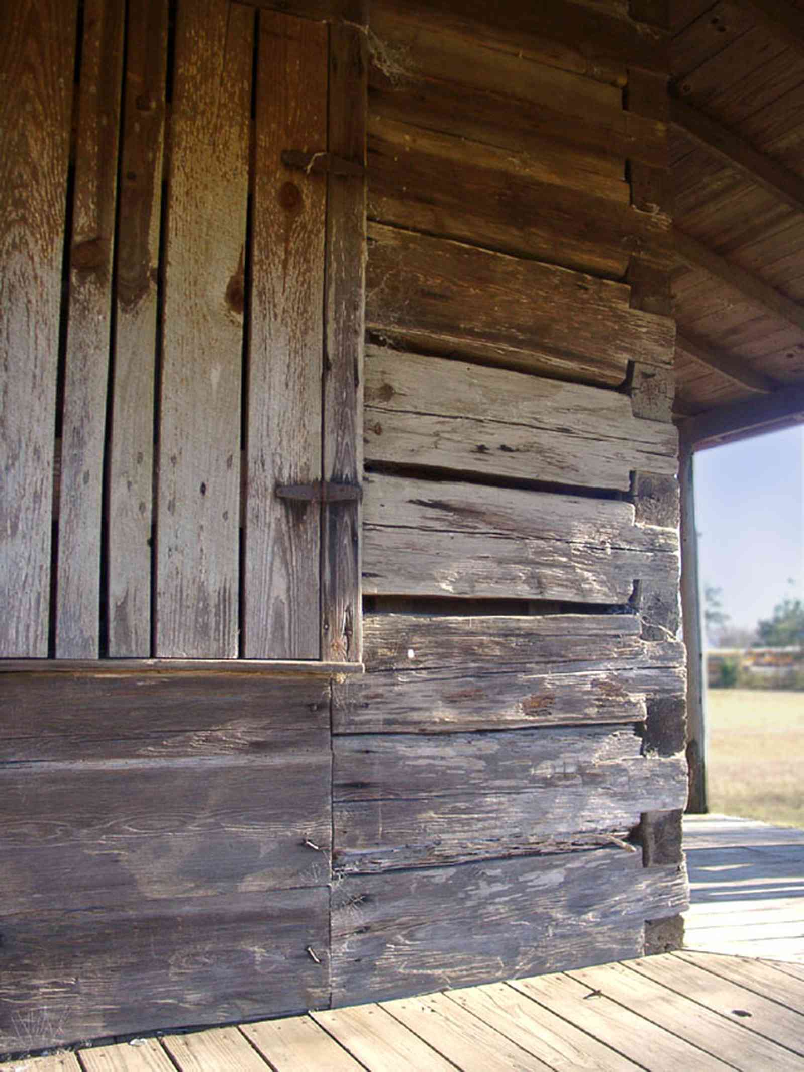 Walnut-Hill:-School_06.jpg:  log cabin, mortise and tendon joints, shutters, porch, cotton field