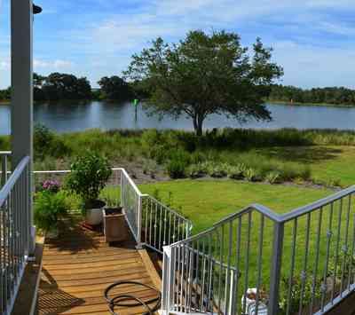 400+LaRua+Landing-2nd+floor++porch+facing+bayou+texar_05.jpg:  stairs, railing, porch, Bayou Texar, Florida, Escambia County, Pensacola, 