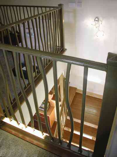 Aragon:-649-Aragon-Street_34.jpg:  upstairs, stairwell, second floor, wrought-iron railing, second floor