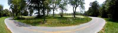 Blackwater-River-State-Park:-Indian-Ford-Road_01.jpg:  farmland, curving road, oak trees, backwoods, two-lane road, santa rosa county, Road