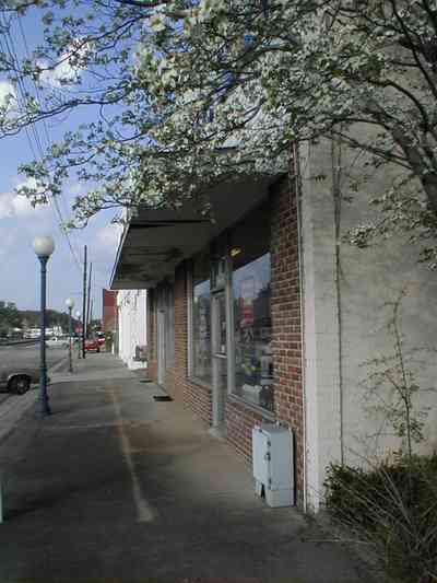 Brewton:-Downtown_03.jpg:  store front facades, railroad tracks, main street america, 1920's architecture, midwestern architecture, lumber town