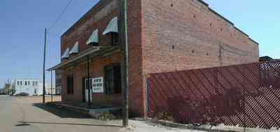 Brewton:-Downtown_08a.jpg:  store front facades, railroad tracks, main street america, 1920's architecture, midwestern architecture, lumber town