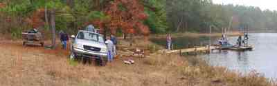 Century:-Bluff-Springs-Campground_11.jpg:  lake, oak tree, pine tree, fog, ford truck