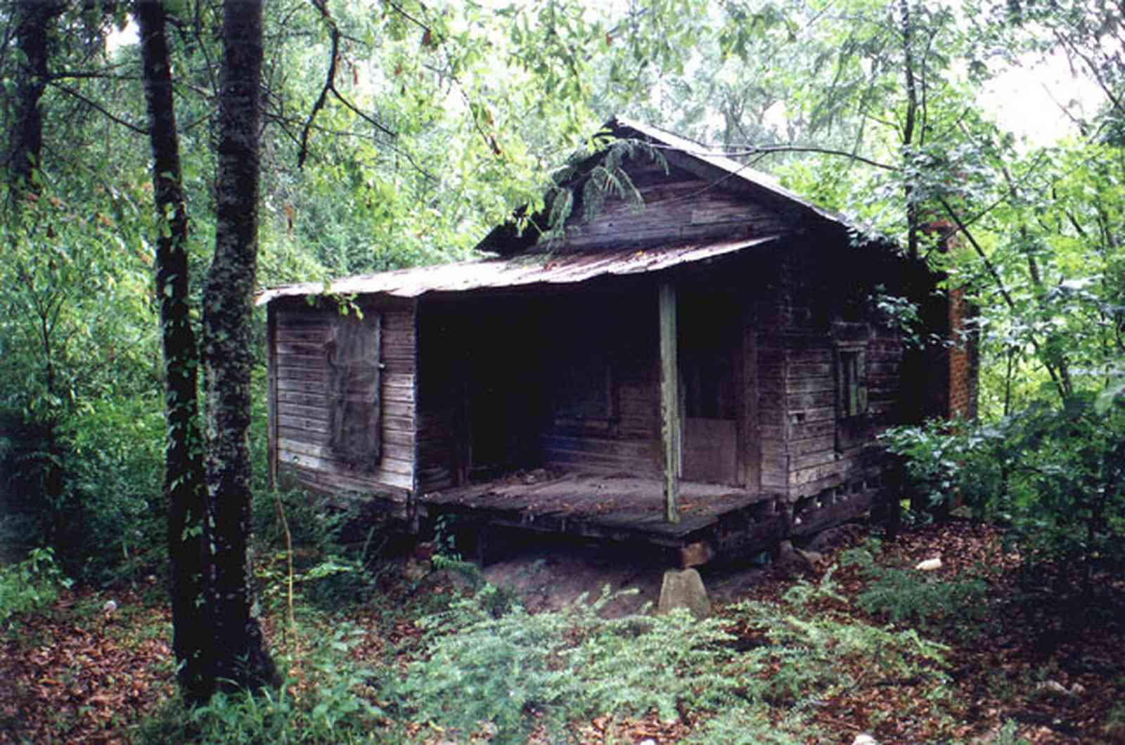 Century:-Shotgun-Mill-Houses_02.jpg:  shack, falling down house, dilipated house, junk pile