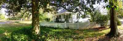 East-Hill:-1602-Moreno-Street_02.jpg:  victorian cottage, oak tree, english ivy, magnolia tree